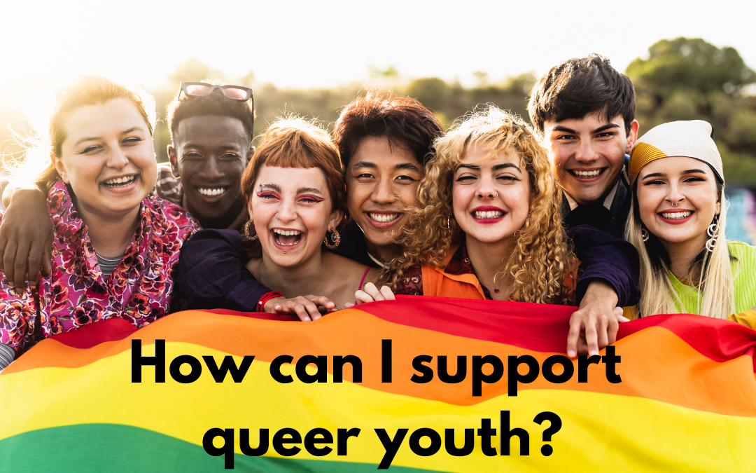 Picture of 7 young people standing together, smiling, and holding a rainbow flag. At the bottom is the text: How can I support queer youth?